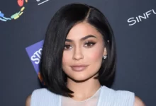 Kylie Jenner wears a gold trinity ring on her wedding finger
