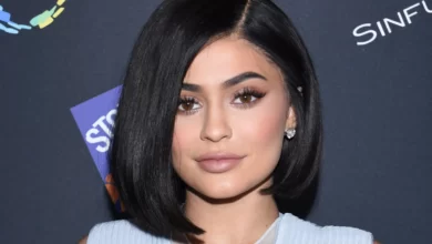 Kylie Jenner wears a gold trinity ring on her wedding finger